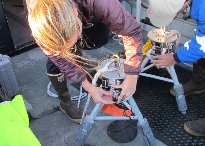 Researcher prepping an underwater video camera